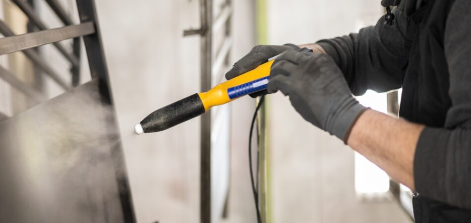 The,detail,of,a,man,working,in,a,factory,finishes